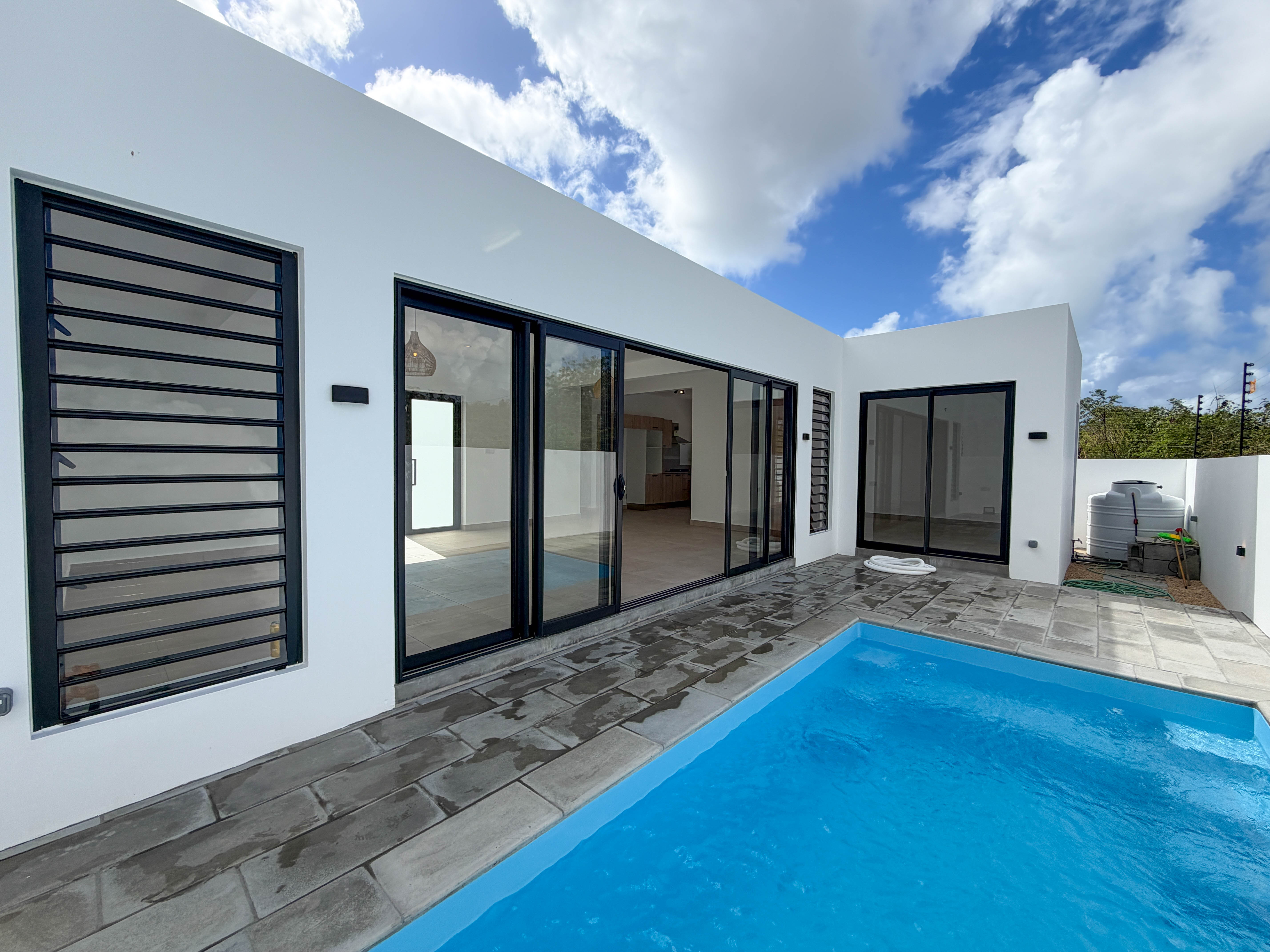 FOR SALE - A BRAND NEW 3-BEDROOM VILLA WITH PRIVATE POOL IN GRAND BAY, RS 10.5M 