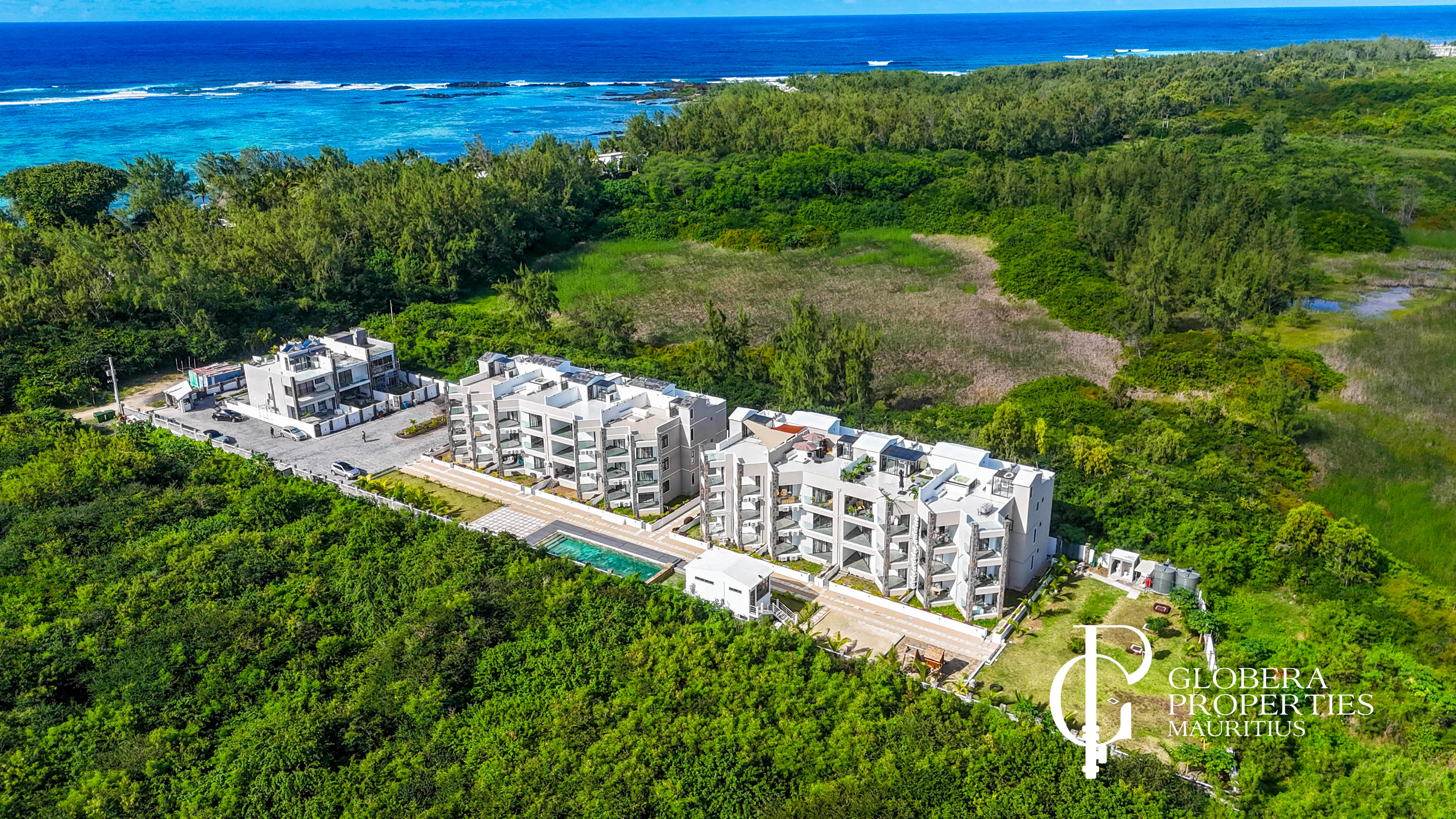 FOR SALE - 2-BEDROOM APARTMENT IN A GATED RESIDENCE- COASTAL ROAD - ROCHES NOIRES